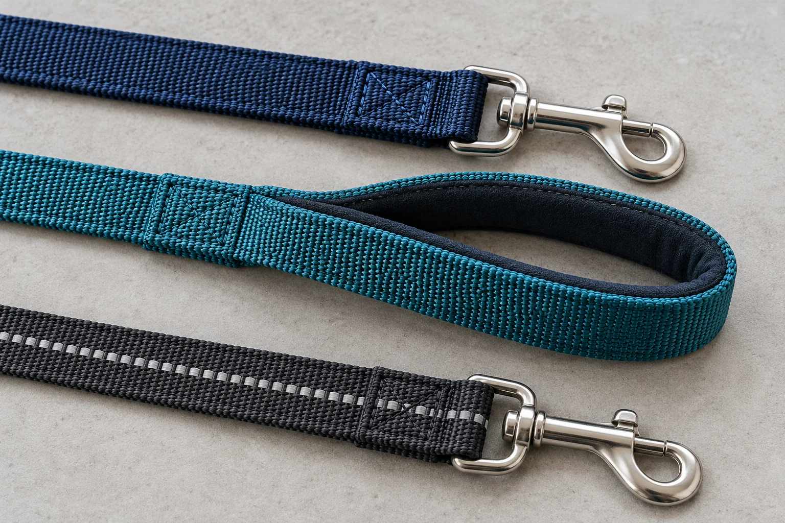 Nylon dog leash samples showing different webbing textures, folded stitching, and reflective details
